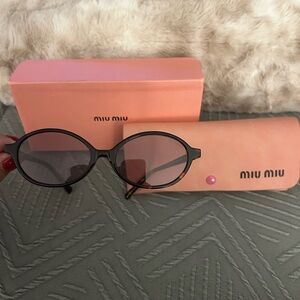 Miu Miu tortoise shell color sunglasses